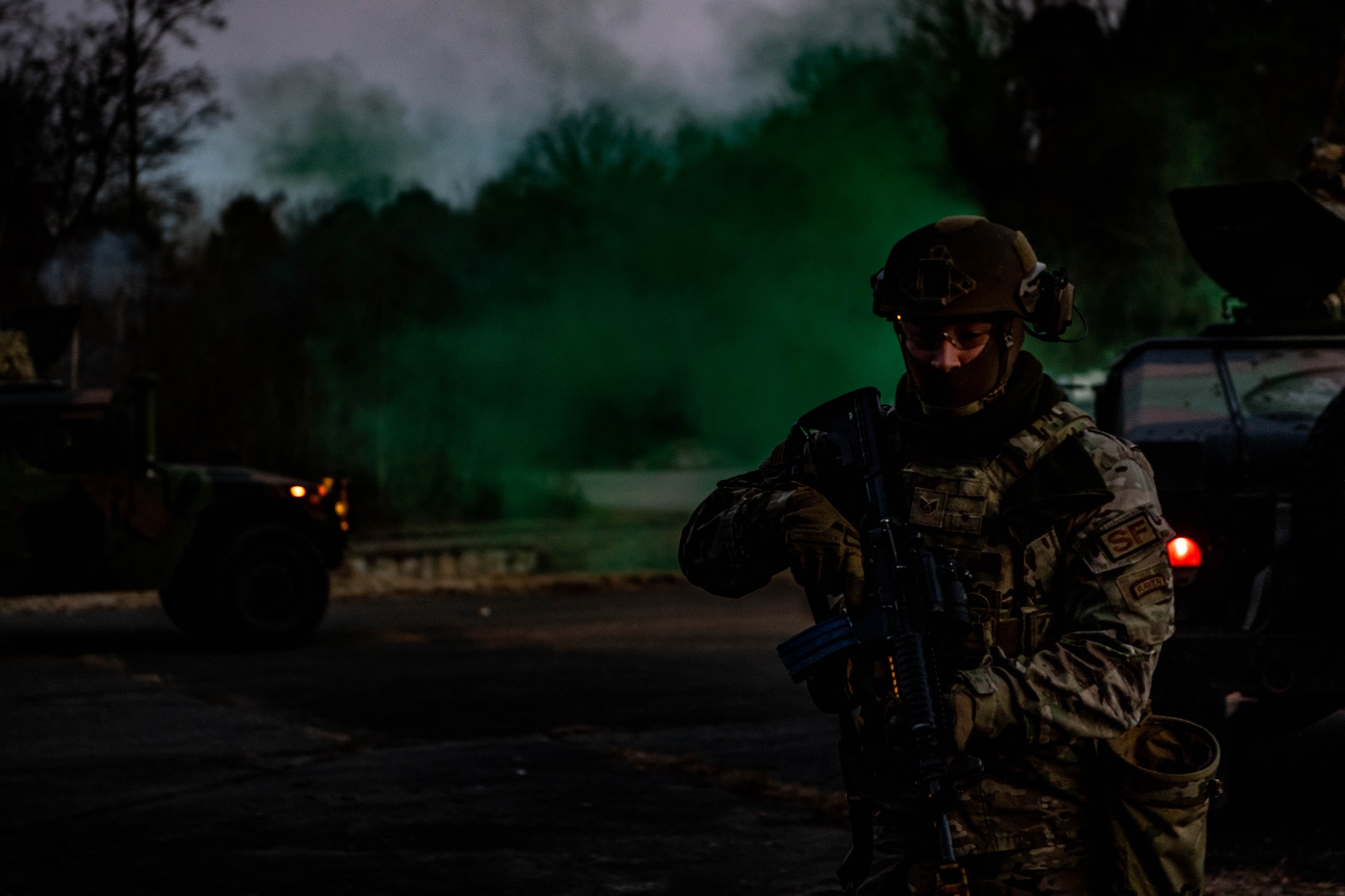 Airman holds gun