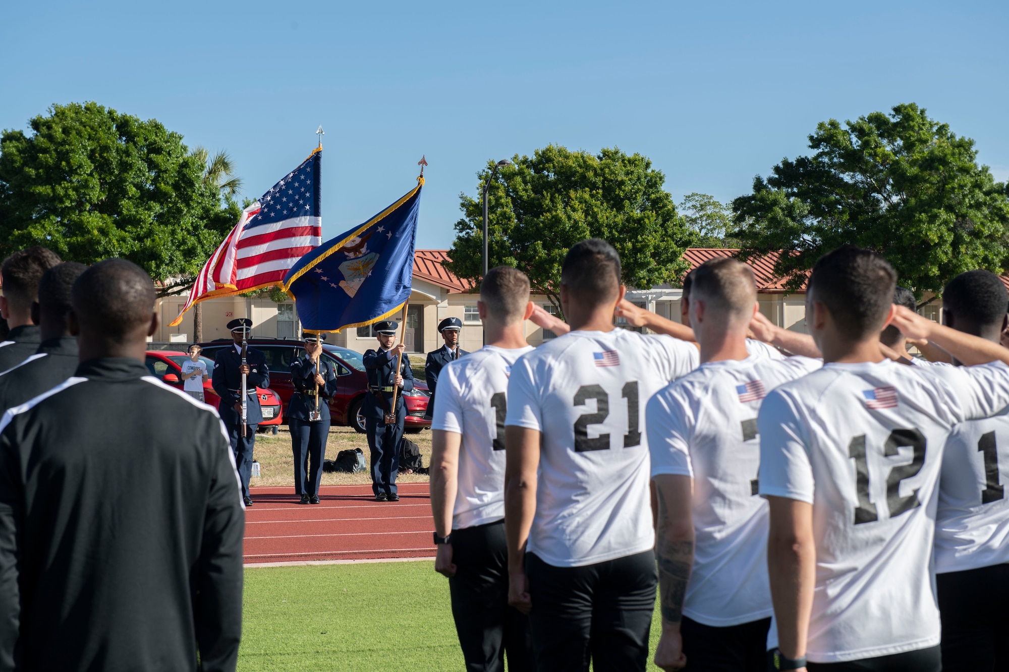 U.S. service members stand in formation during the opening ceremony of the Armed Forces Men’s Soccer Tournament at MacDill Air Force Base, Florida, March 6, 2022.
