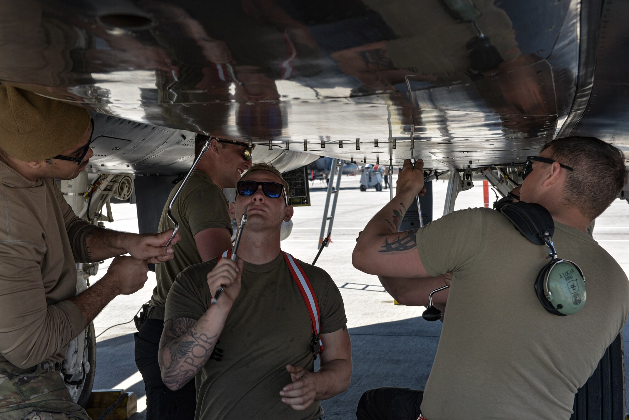 U.S. Air Force maintainers of the 389th Fighter Generation Squadron works on an F-15E Strike Eagle.