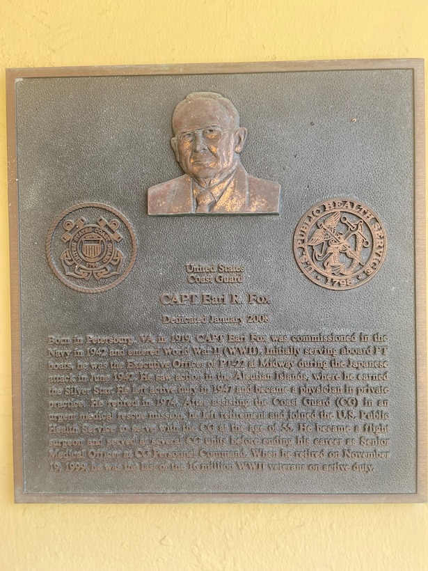 Plaque of Base San Juan Clinic namesake.