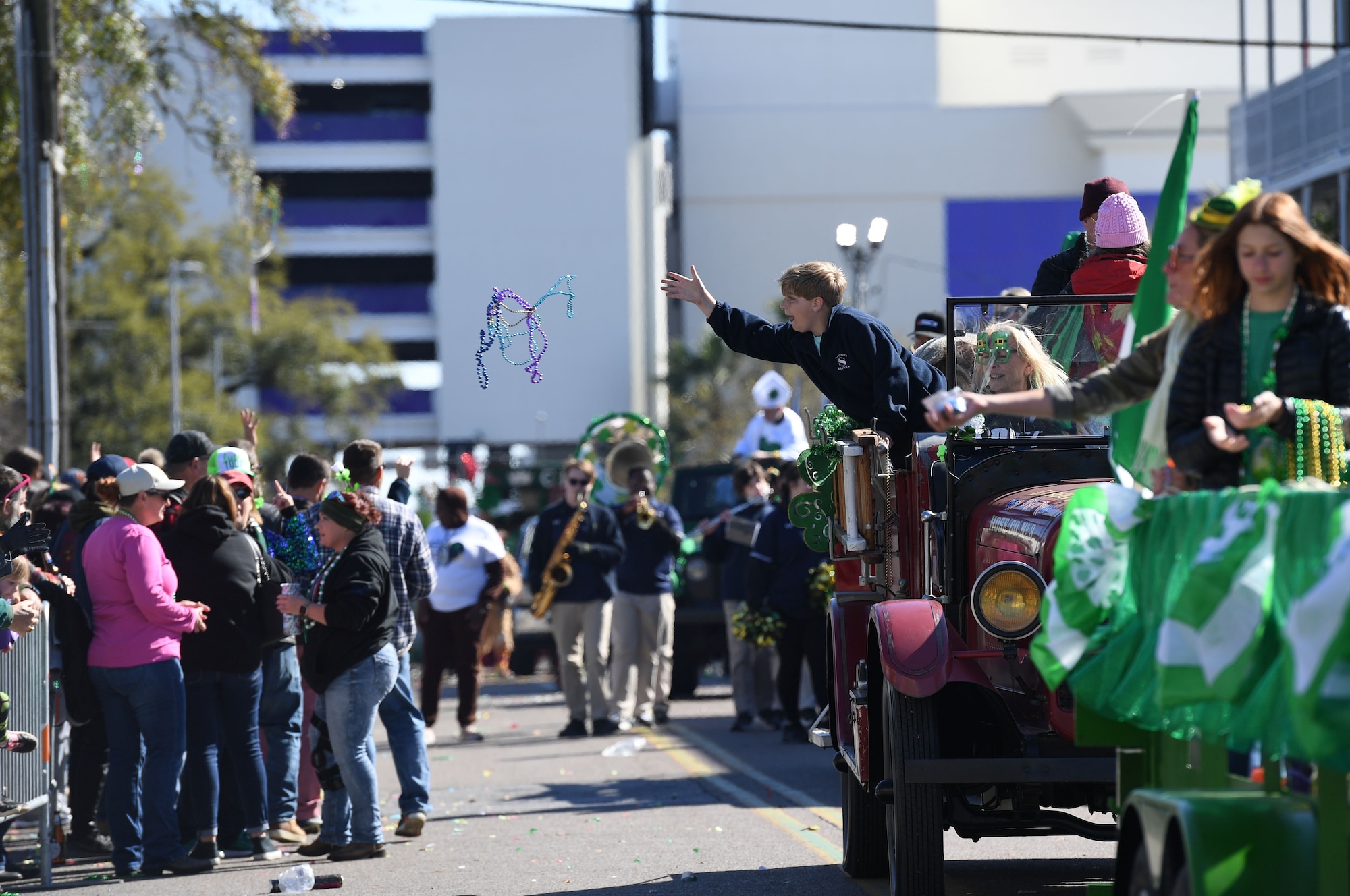 Decorative floats ride through Biloxi during the Hibernia Marching Society of Mississippi St. Patrick's Day Parade in Biloxi, Mississippi, March 12, 2022. Keesler personnel participated in the local parade to show their support of the communities surrounding the installation. (U.S. Air Force photo by Kemberly Groue)