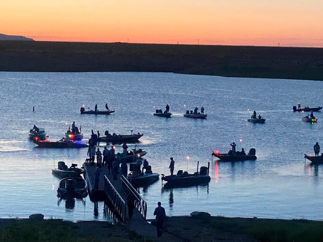 CONCHAS LAKE, N.M. -- Anglers participate in an early morning bass fishing tournament at the South Dock, July 10, 2021. Photo by Nadine Carter, park ranger, Conchas Lake.