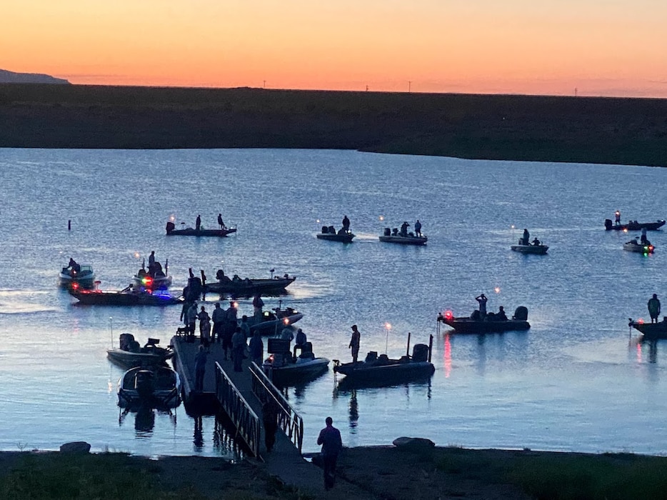 CONCHAS LAKE, N.M. -- Anglers participate in an early morning bass fishing tournament at the South Dock, July 10, 2021. Photo by Nadine Carter.