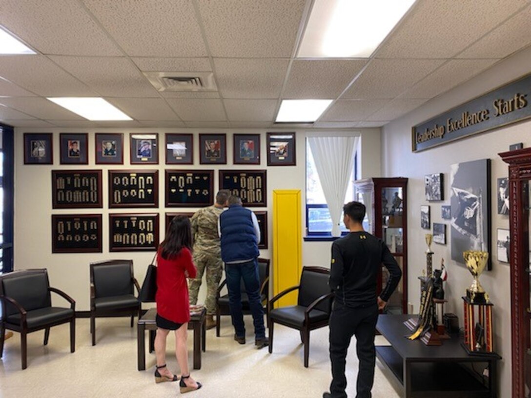 EL PASO, TEXAS – Capt. Robert Zebrowski located his mother’s name on the wall of UTEP ROTC cadets commissioned from the class of 1986 while recruiting for USACE on campus as part of the USACE's Engineer Roadshow during National Engineer Week. The captain and other Albuquerque District personnel were at UTEP to share about potential future employment opportunities with USACE during and after military service to the cadets and cadre on campus. (l-r): Stephanie Parra, deputy, Small Business Programs; Capt. Robert Zebrowski, project engineer; Sgt. 1st Class Julio Jurado, UTEP Senior Military Instructor; and one of the cadets in the UTEP ROTC program. Photo by Maj. Brett Fuller, Deputy District Commander.
