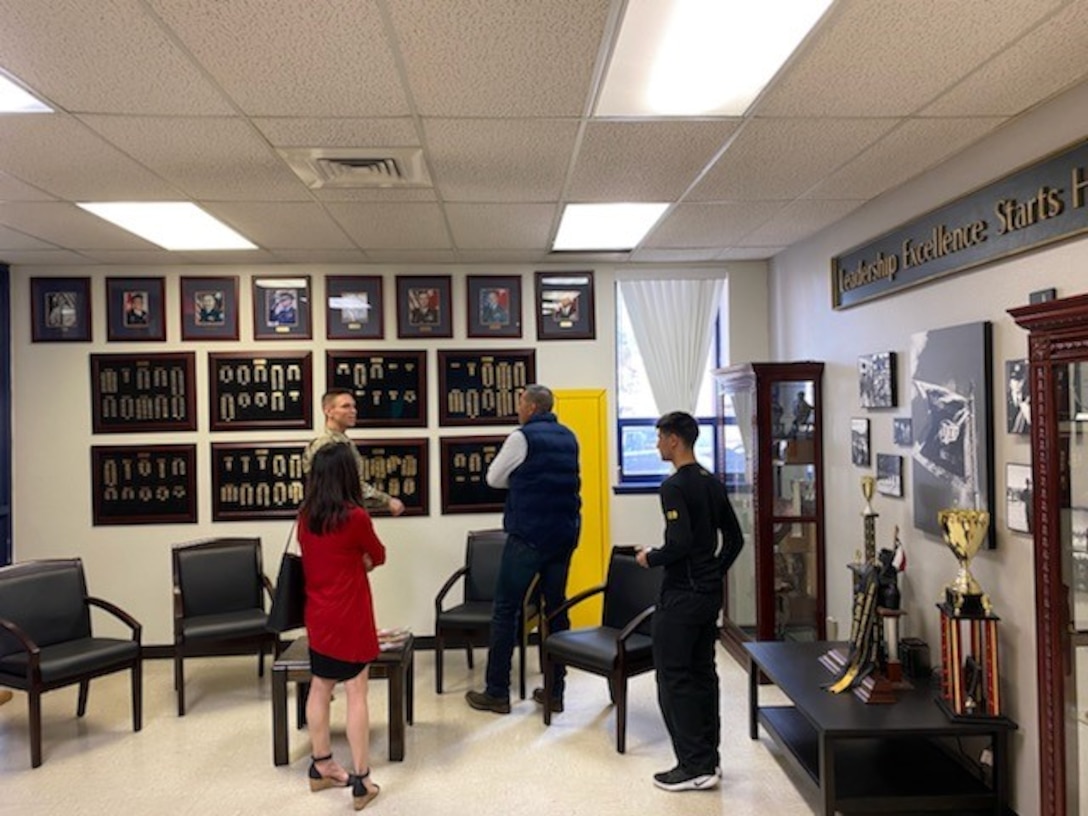 EL PASO, TEXAS – Capt. Robert Zebrowski located his mother’s name on the wall of UTEP ROTC cadets commissioned from the class of 1986 while recruiting for USACE on campus as part of the USACE's Engineer Roadshow during National Engineer Week. The captain and other Albuquerque District personnel were at UTEP to share about potential future employment opportunities with USACE during and after military service to the cadets and cadre on campus. (l-r): Stephanie Parra, deputy, Small Business Programs; Capt. Robert Zebrowski, project engineer; Sgt. 1st Class Julio Jurado, UTEP Senior Military Instructor; and one of the cadets in the UTEP ROTC program. Photo by Maj. Brett Fuller, Deputy District Commander.