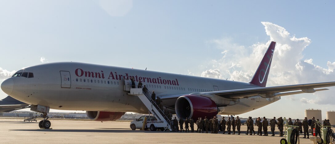 U.S. Marines with the Command Element, 5th Marine Regiment, Marine Rotational Force Darwin (MRF-D) 22 enter Royal Australian Air Force Base Darwin, NT, Australia, March 12, 2022. MRF-D 22 is a six month rotation where U.S. Marines, the Australian Defence Force, and other allied and partner nations enhance their interoperability and readiness posture in the Indo-Pacific region. (U.S. Marine Corps Photo by Cpl. Cedar Barnes)