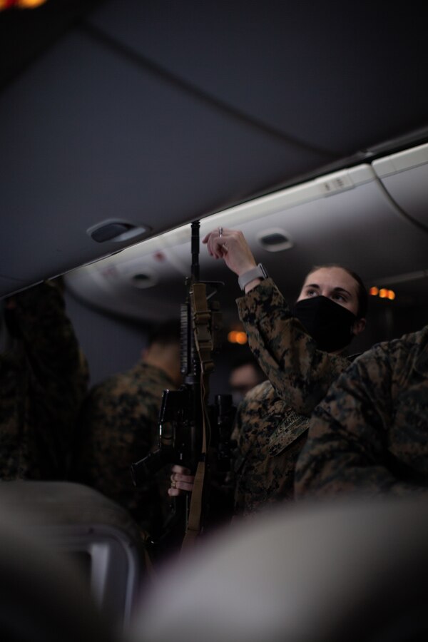 U.S. Marines with the Command Element, 5th Marine Regiment, Marine Rotational Force Darwin (MRF-D) 22 enter Royal Australian Air Force Base Darwin, NT, Australia, March 12, 2022. MRF-D 22 is a six month rotation where U.S. Marines, the Australian Defence Force, and other allied and partner nations enhance their interoperability and readiness posture in the Indo-Pacific region. (U.S. Marine Corps Photo by Cpl. Cedar Barnes)