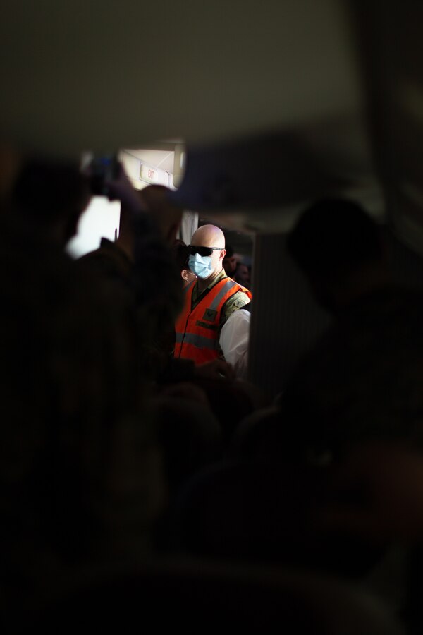 U.S. Marines with the Command Element, 5th Marine Regiment, Marine Rotational Force Darwin (MRF-D) 22 enter Royal Australian Air Force Base Darwin, NT, Australia, March 12, 2022. MRF-D 22 is a six month rotation where U.S. Marines, the Australian Defence Force, and other allied and partner nations enhance their interoperability and readiness posture in the Indo-Pacific region. (U.S. Marine Corps Photo by Cpl. Cedar Barnes)