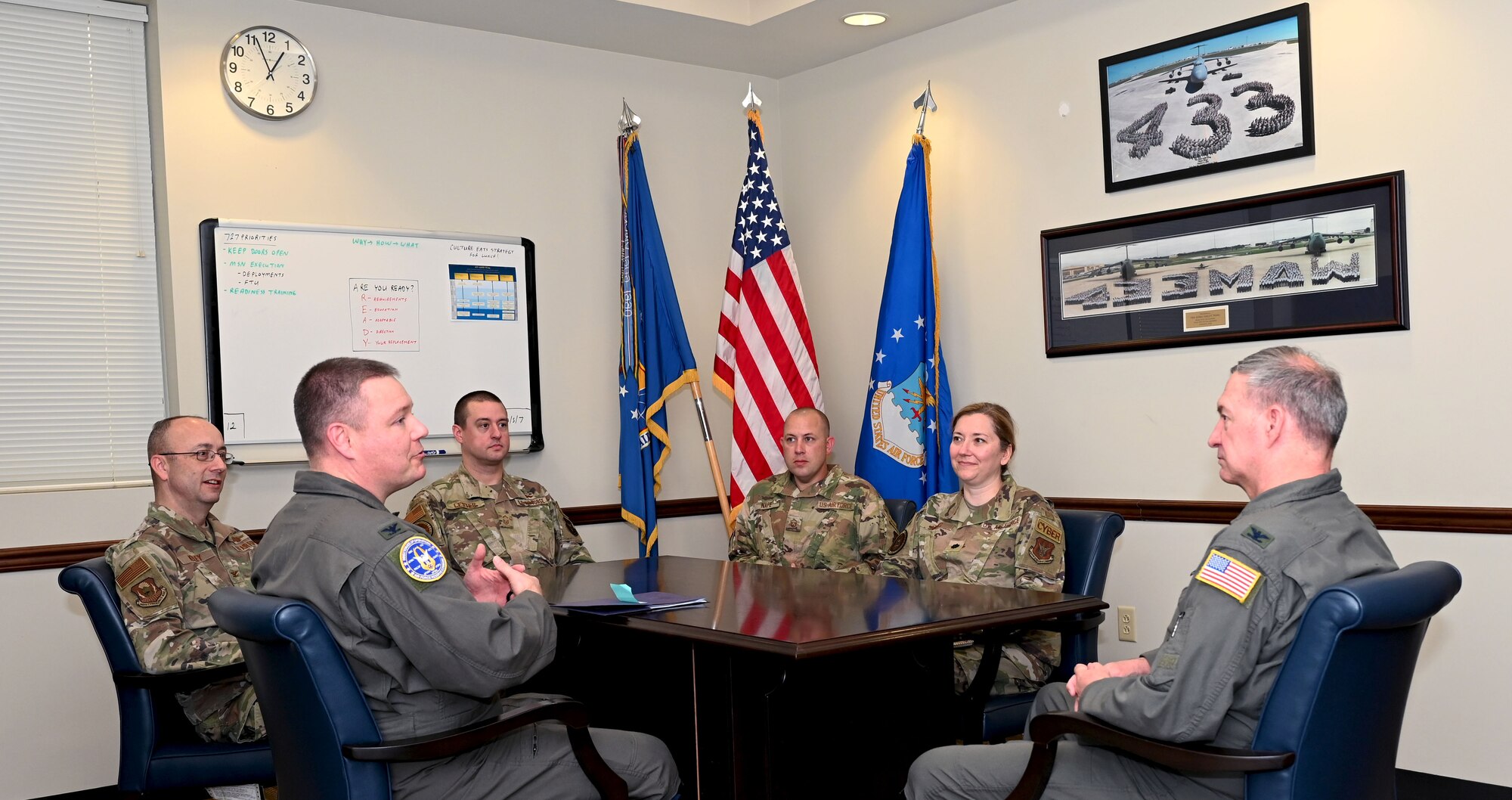 Col. Don Kelley, 960th Cyberspace Wing director of wing plans (left) and Col. Terry W. McClain, 433rd Airlift Wing commander (right) meet with Air Force Reserve Command A3, Air, Space, Information Operations staff members; Col. Matthew Trovinger, current operations division chief; Senior Master Sgt. David Lester, cyber standards and evaluation; Master Sgt. David Nafe, cyber training manager; and Lt. Col. Melissa Milas, information warfare branch chief, March 3, 2022, at Joint Base San Antonio-Lackland, Texas. The A3 team met with 960th CW and 433rd AW personnel in an effort familiarize themselves with the cyberspace wing’s non-traditional mission set and evaluate the playbook for future compliance inspections. (U.S. Air Force photo by Samantha Mathison)