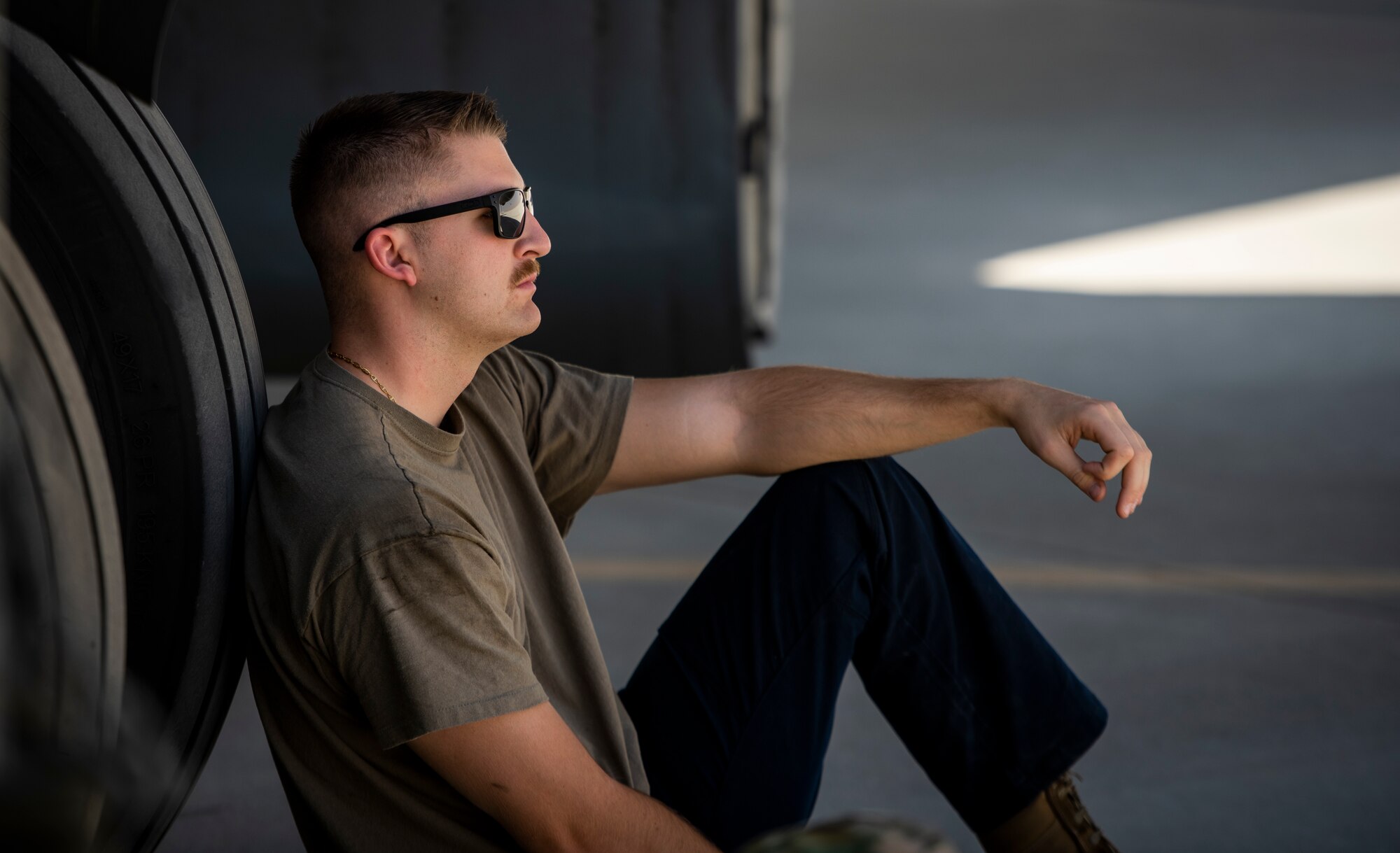 Airman rests in the shade.