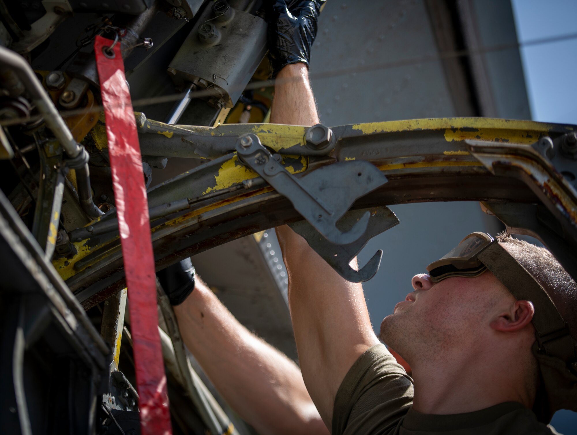 Airmen repair  a KC-135.