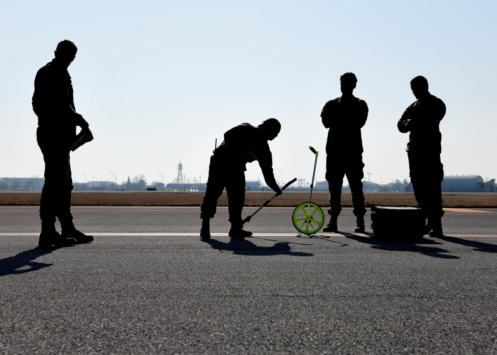 U.S. Air Force Airmen assigned to the 31st Operations Support Squadron Airfield Management and Air Traffic Control Tower train on airfield management contingency response procedures at Aviano Air Base, Italy, March 10, 2022. The members trained on airfield management contingency response procedures and used a Phantom AZL-15 lighting kit to simulate landing zones for a variety of aircraft including, C-17 Globemasters and C-130 Hercules. The Phantom AZL-15 lighting kit displays colors such as red, green, blue, white and infrared. (U.S. Air Force photo by Senior Airman Brooke Moeder)