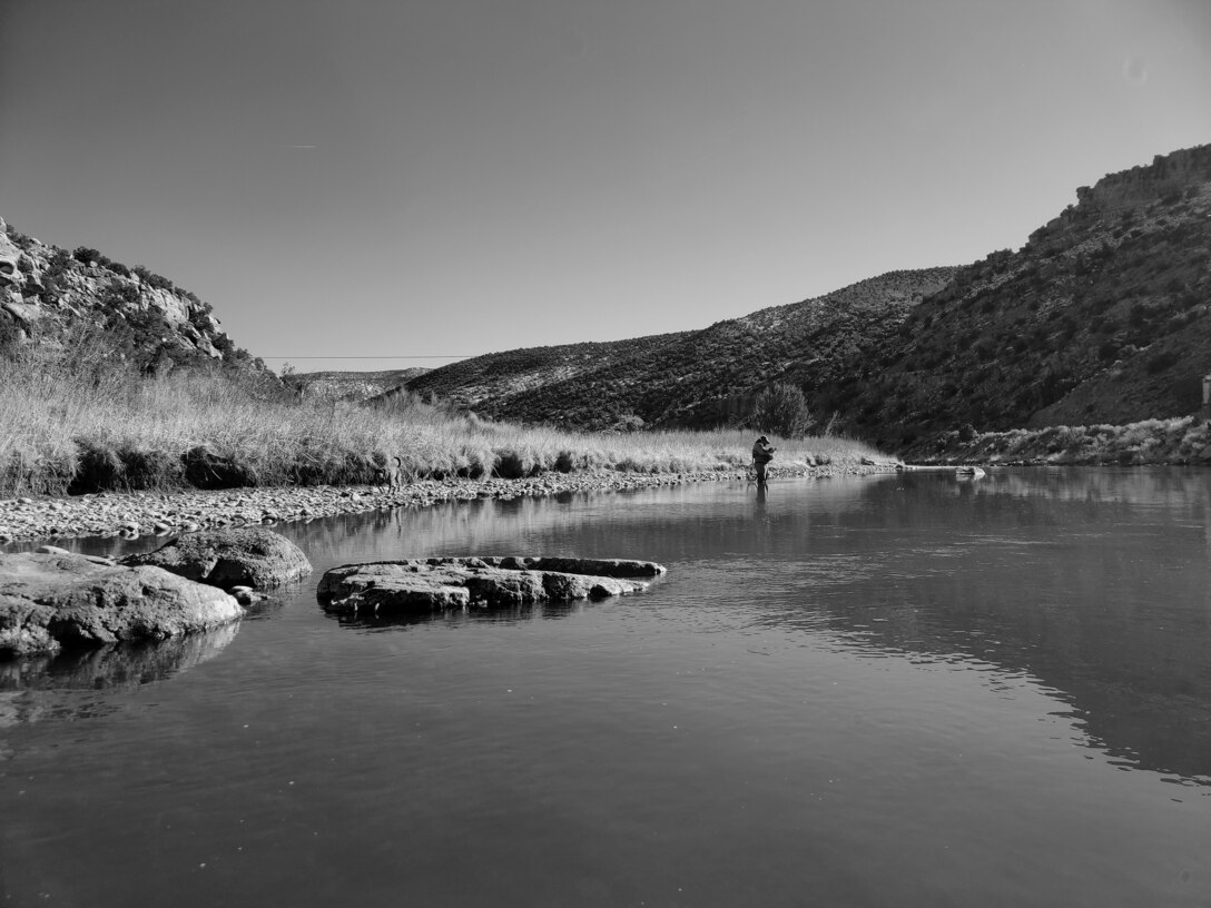 ABIQUIU LAKE, N.M. -- A man fishes on the Rio Chama, downstream of Abiquiu Dam, Jan. 29, 2022. Photo by Michael Kohler, field office administrative assistant, Abiquiu Lake.