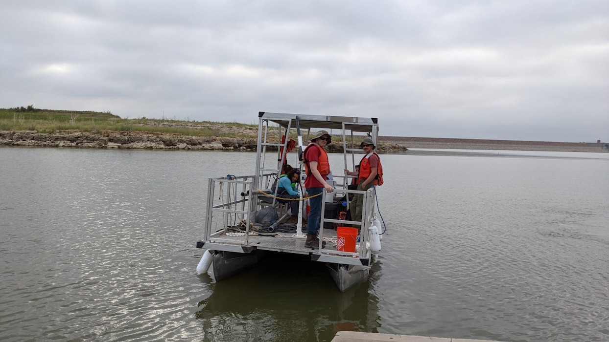 JOHN MARTIN RESERVOIR, Colo. -- Albuquerque District Geotechnical crew with Vibracore drilling lake sediments, July 15, 2021. Adam Tew, Alex Norway, Matt Segora onboard the John Martin project boat driven by Job Licano. Photo by Chris Carroll.