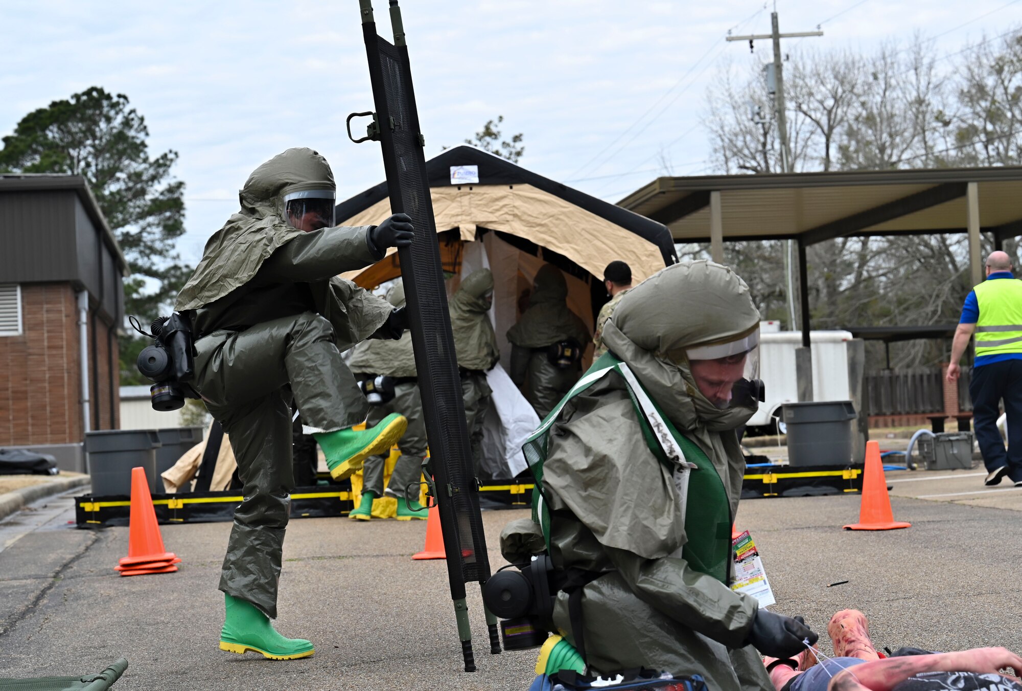 A medic from the 14th Medical Group at Columbus Air Force Base, Miss., props open a stretcher at a the Ready Eagle Exercise on March 11, 2022. Patients at the 14th MDG were scanned at a CBRNE decontamination zone. (U.S. Air Force photo by Airman 1st Class Jessica Haynie)