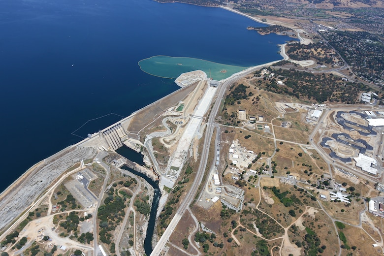An aerial view of a lake and dam
