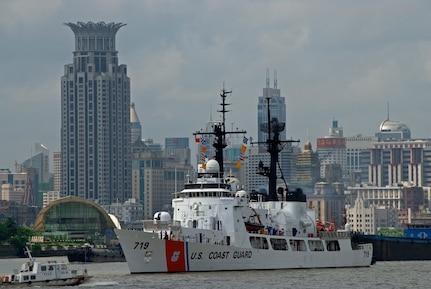 The crew of the U.S. Coast Guard Cutter Boutwell, a 378-foot High Endurance Cutter home ported in Alameda, Calif., bids farewell to the China coast guard