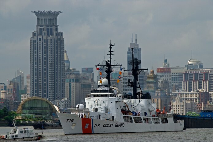 The crew of the U.S. Coast Guard Cutter Boutwell, a 378-foot High Endurance Cutter home ported in Alameda, Calif., bids farewell to the China coast guard