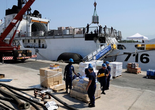 U.S. Coast Guard personnel load supplies aboard the U.S. Coast Guard Cutter Dallas Thursday, Aug. 21, 2008.