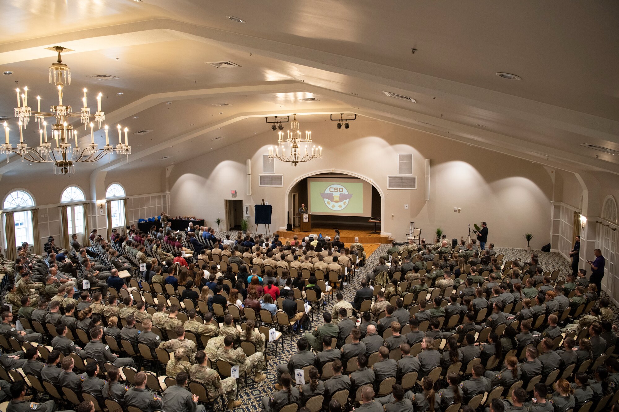 Attendees gather to hear from guest speakers at the Undergraduate Combat Systems Officer Training (UCT) Sapphire Event March 11, 2022, at Naval Air Station Pensacola, Florida.