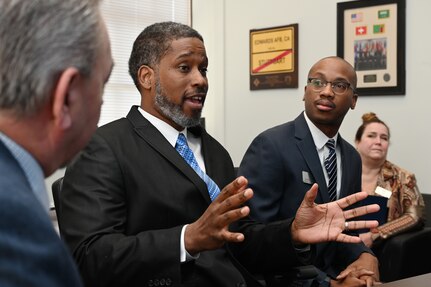 Horace Franklin, Naval District Washington school liaison, speaks during an engagement with Cherise Imai, executive director of the Military Interstate Children's Compact Commission, listens to Commissioner Clara Botstein, director of legislation and government relations at the D.C. office of the deputy mayor for education, Joint Base Anacostia-Bolling, Washington, D.C. on March 15, 2022. Botstein and Imai toured JBAB, Washington, D.C. and met with U.S. Air Force Col. Erica Rabe, 11th Wing and JBAB vice commander, members of the 11th Force Support Squadron and the LEARN DC team in order to gain a deeper understanding of the concerted interagency effort that made the base's first charter school possible, as well as to learn about the diverse mission partners that operate on the installation. (U.S. Air Force photo by Staff Sgt. Kayla White))