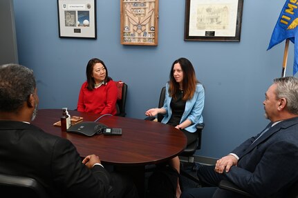 Cherise Imai, executive director of the Military Interstate Children's Compact Commission, listens to Commissioner Clara Botstein, director of legislation and government relations at the D.C. office of the deputy mayor for education, during an engagement at Joint Base Anacostia-Bolling, Washington, D.C. on March 15, 2022. Botstein and Imai toured JBAB, Washington, D.C. and met with U.S. Air Force Col. Erica Rabe, 11th Wing and JBAB vice commander, members of the 11th Force Support Squadron and the LEARN DC team in order to gain a deeper understanding of the concerted interagency effort that made the base's first charter school possible, as well as to learn about the diverse mission partners that operate on the installation. (U.S. Air Force photo by Staff Sgt. Kayla White)