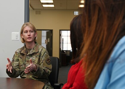 U.S. Air Force Col. Erica Rabe, 11th Wing and Joint Base Anacostia-Bolling vice commander, speaks to Commissioner Clara Botstein, director of legislation and government relations at the D.C. office of the deputy mayor for education; and Cherise Imai, executive director of the Military Interstate Children's Compact Commission, on March 15, 2022 about the base's first charter school, LEARN DC. Botstein and Imai also toured JBAB, Washington, D.C. and met members of the 11th Force Support Squadron in order to gain a deeper understanding of LEARN DC and the concerted interagency effort that made it possible, as well as to learn about the diverse mission partners that operate on the installation. (U.S. Air Force photo by Staff Sgt. Kayla White)