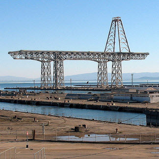 The battleship crane dominates the skyline of the Hunters Point area
