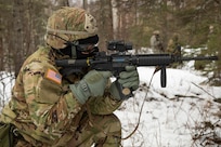 Alaska Army National Guard Soldiers with Avalanche Company, 1-297th Infantry Battalion, practice squad and platoon situational training exercises (STX) at Alcantra armory in Wasilla, Alaska, March 11, 2022. An STX is a short, scenario-driven, mission-oriented exercise designed to train one collective task or a group of related tasks or battle drills. For the A-Co. Soldiers, the STX allows for evaluation of basic Soldier skills and leadership competencies to determine proficiency and certify the platoon to conduct live-fire exercises. It also reinforces previous training that the Soldiers have completed by bringing the entire platoon together to further prepare the unit for live-fire training. The infantrymen are preparing to participate in the Army National Guard’s eXportable Combat Training Capability (XCTC) program, which is a brigade field training exercise similar to a Combat Training Center. They will participate in an XCTC rotation at Camp Roberts, California, July 2022. (U.S. Army National Guard photo by Victoria Granado)