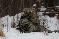 Alaska Army National Guard Soldiers with Avalanche Company, 1-297th Infantry Battalion, practice squad and platoon situational training exercises (STX) at Alcantra armory in Wasilla, Alaska, March 11, 2022. An STX is a short, scenario-driven, mission-oriented exercise designed to train one collective task or a group of related tasks or battle drills. For the A-Co. Soldiers, the STX allows for evaluation of basic Soldier skills and leadership competencies to determine proficiency and certify the platoon to conduct live-fire exercises. It also reinforces previous training that the Soldiers have completed by bringing the entire platoon together to further prepare the unit for live-fire training. The infantrymen are preparing to participate in the Army National Guard’s eXportable Combat Training Capability (XCTC) program, which is a brigade field training exercise similar to a Combat Training Center. They will participate in an XCTC rotation at Camp Roberts, California, July 2022. (U.S. Army National Guard photo by Spc. Grace Nechanicky)