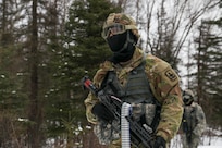 Alaska Army National Guard Soldiers with Avalanche Company, 1-297th Infantry Battalion, practice squad and platoon situational training exercises (STX) at Alcantra armory in Wasilla, Alaska, March 11, 2022. An STX is a short, scenario-driven, mission-oriented exercise designed to train one collective task or a group of related tasks or battle drills. For the A-Co. Soldiers, the STX allows for evaluation of basic Soldier skills and leadership competencies to determine proficiency and certify the platoon to conduct live-fire exercises. It also reinforces previous training that the Soldiers have completed by bringing the entire platoon together to further prepare the unit for live-fire training. The infantrymen are preparing to participate in the Army National Guard’s eXportable Combat Training Capability (XCTC) program, which is a brigade field training exercise similar to a Combat Training Center. They will participate in an XCTC rotation at Camp Roberts, California, July 2022. (U.S. Army National Guard photo by Spc. Grace Nechanicky)