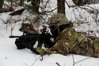 Alaska Army National Guard Soldiers with Avalanche Company, 1-297th Infantry Battalion, practice squad and platoon situational training exercises (STX) at Alcantra armory in Wasilla, Alaska, March 11, 2022. An STX is a short, scenario-driven, mission-oriented exercise designed to train one collective task or a group of related tasks or battle drills. For the A-Co. Soldiers, the STX allows for evaluation of basic Soldier skills and leadership competencies to determine proficiency and certify the platoon to conduct live-fire exercises. It also reinforces previous training that the Soldiers have completed by bringing the entire platoon together to further prepare the unit for live-fire training. The infantrymen are preparing to participate in the Army National Guard’s eXportable Combat Training Capability (XCTC) program, which is a brigade field training exercise similar to a Combat Training Center. They will participate in an XCTC rotation at Camp Roberts, California, July 2022. (U.S. Army National Guard photo by Spc. Grace Nechanicky)