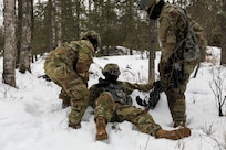 Alaska Army National Guard Soldiers with Avalanche Company, 1-297th Infantry Battalion, practice squad and platoon situational training exercises (STX) at Alcantra armory in Wasilla, Alaska, March 11, 2022. An STX is a short, scenario-driven, mission-oriented exercise designed to train one collective task or a group of related tasks or battle drills. For the A-Co. Soldiers, the STX allows for evaluation of basic Soldier skills and leadership competencies to determine proficiency and certify the platoon to conduct live-fire exercises. It also reinforces previous training that the Soldiers have completed by bringing the entire platoon together to further prepare the unit for live-fire training. The infantrymen are preparing to participate in the Army National Guard’s eXportable Combat Training Capability (XCTC) program, which is a brigade field training exercise similar to a Combat Training Center. They will participate in an XCTC rotation at Camp Roberts, California, July 2022. (U.S. Army National Guard photo by Spc. Grace Nechanicky)