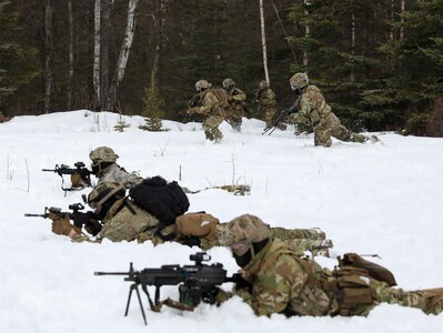 Alaska Army National Guard Soldiers with Avalanche Company, 1-297th Infantry Battalion, practice squad and platoon situational training exercises (STX) at Alcantra armory in Wasilla, Alaska, March 11, 2022. An STX is a short, scenario-driven, mission-oriented exercise designed to train one collective task or a group of related tasks or battle drills. For the A-Co. Soldiers, the STX allows for evaluation of basic Soldier skills and leadership competencies to determine proficiency and certify the platoon to conduct live-fire exercises. It also reinforces previous training that the Soldiers have completed by bringing the entire platoon together to further prepare the unit for live-fire training. The infantrymen are preparing to participate in the Army National Guard’s eXportable Combat Training Capability (XCTC) program, which is a brigade field training exercise similar to a Combat Training Center. They will participate in an XCTC rotation at Camp Roberts, California, July 2022. (U.S. Army National Guard photo by Spc. Grace Nechanicky)