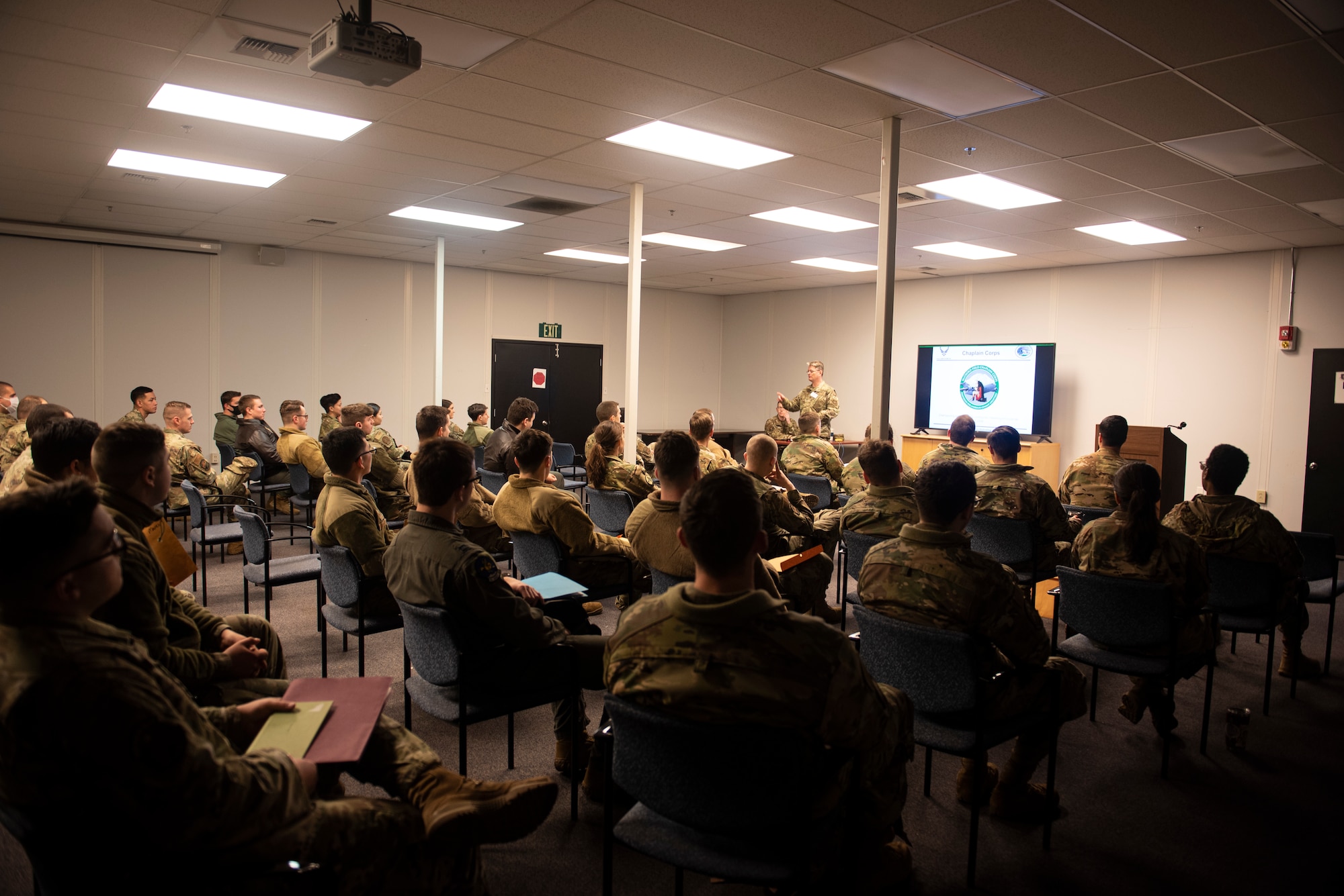 U.S. Air Force Chaplain (Capt.) Timothy Dahl, 627th Air Base Group chaplain, briefs Airmen regarding chaplain services as part of Exercise Rainier War 22A at Joint Base Lewis-McChord, Washington, March 15, 2022. Rainier War 22A exercised and evaluated the wing’s ability to employ the force and its  ability to perform during wartime and/or contingency taskings in a high-intensity, wartime contested, degraded and operationally limited environment while supporting the contingency operations against a near-peer adversary. (U.S. Air Force photo by Master Sgt. Julius Delos Reyes)