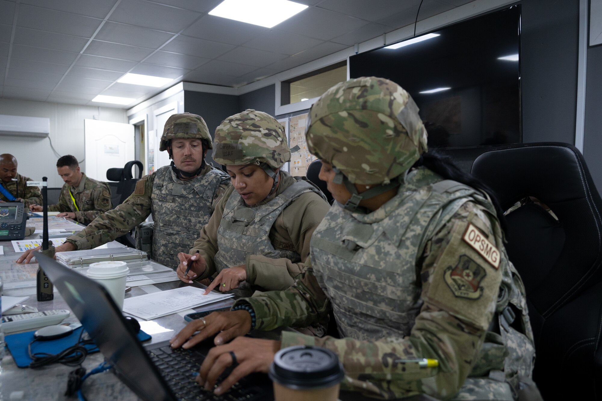 332d Expeditionary Civil Engineer Squadron Airmen collect reported simulated damages during a Rapid Airfield Damage Recovery (RADR) exercise at an undisclosed location in Southwest Asia, Feb. 10, 2022. This exercise tested the ability of the 332d ECES to rapidly repair runways and runway support structures to recover and resume airfield operations after it has experienced significant damage. The 332d ECES provides, operates, and maintains a sustainable installation through engineering and emergency response services across the full mission spectrum. (U.S Air Force photo by Tech. Sgt. Lauren M. Snyder)