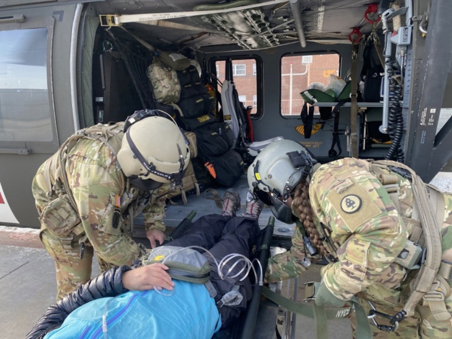 A Tennessee National Guard medical crew arrives at University of Tennessee Medical Center with a hiker who suffered a severe illness on the Appalachian Trail March 15, 2022. The Tennessee National Guard conducted the emergency air evacuation.