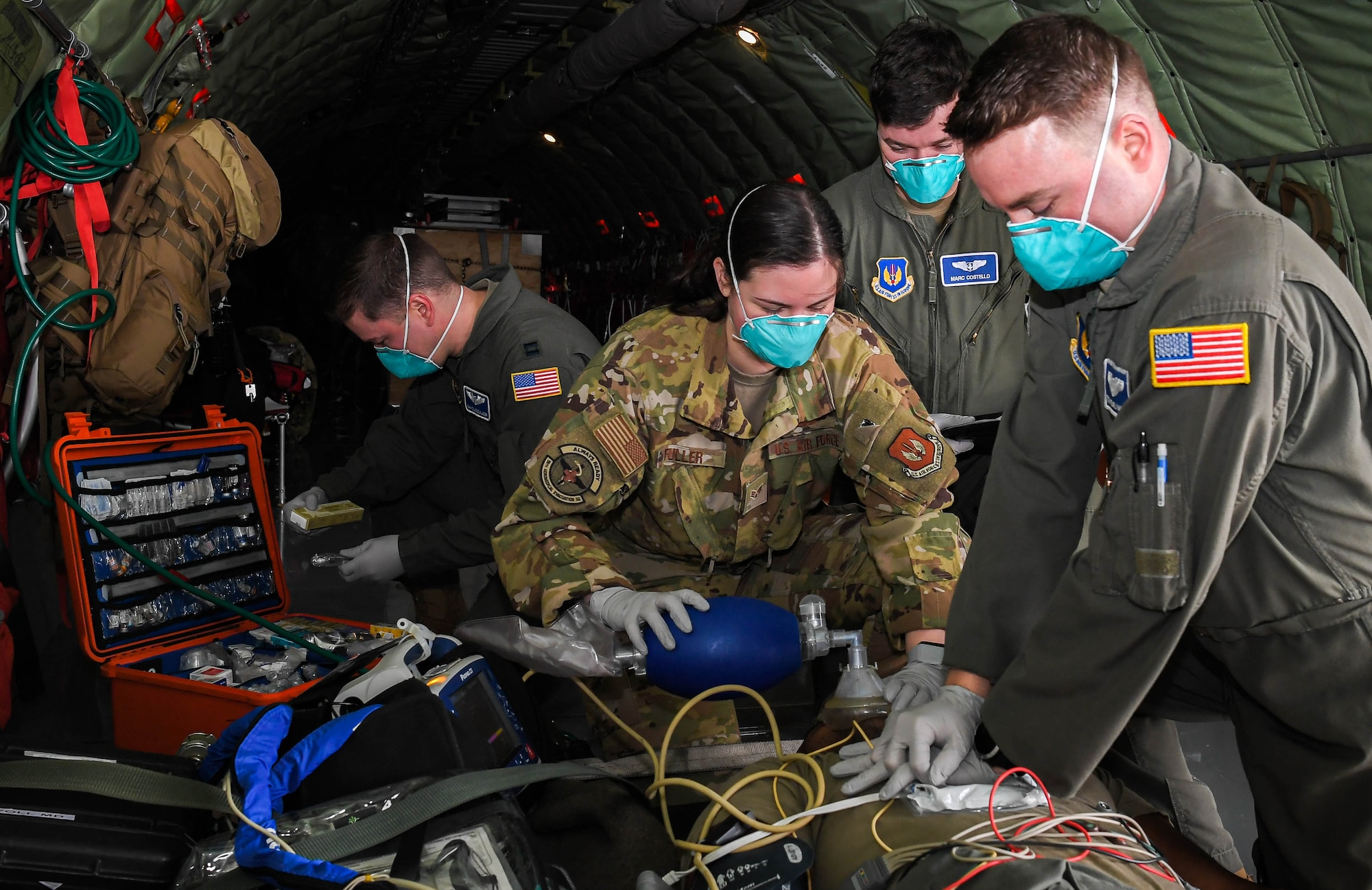 U.S. Air Force Airmen assigned to  the 86th Aeromedical Evacuation Squadron perform advanced life support training at Ramstein Air Base, Germany, March 14, 2022. U.S. Air Force Capt. Adam Olligschlager, left, 86th Airlift Wing plans and programs action officer, was celebrated as Airlifter of the Week March 10, 2022, for his outstanding organization and execution of the Secretary of Defense Dispersal Plan. When Olligschlager isn’t working as an action officer, he assumes regular duties as a flight nurse evaluator at the 86th Aeromedical Evacuation Squadron. (U.S. Air Force photo by Airman 1st Class Jared Lovett)