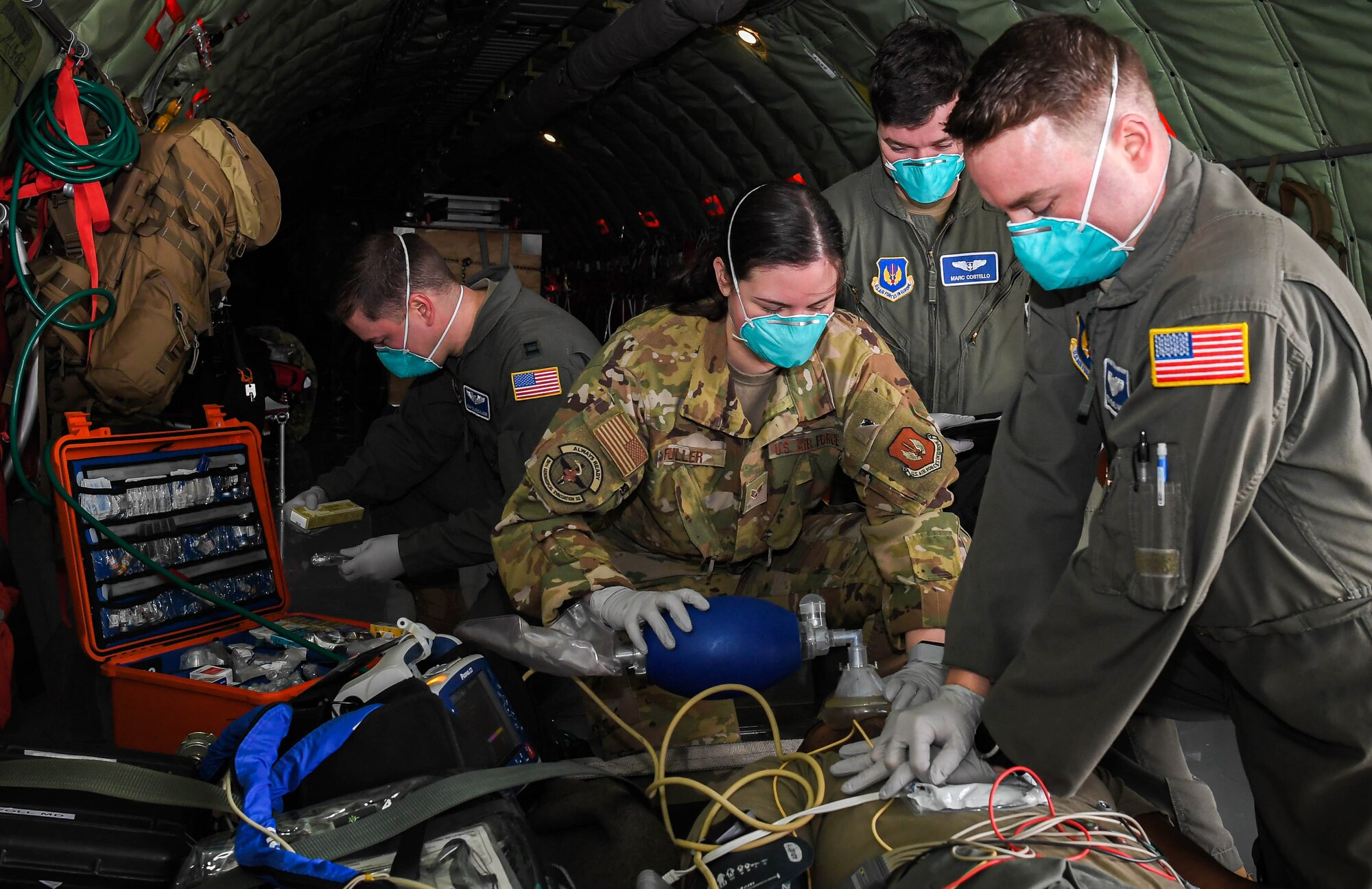 U.S. Air Force Airmen assigned to  the 86th Aeromedical Evacuation Squadron perform advanced life support training at Ramstein Air Base, Germany, March 14, 2022. U.S. Air Force Capt. Adam Olligschlager, left, 86th Airlift Wing plans and programs action officer, was celebrated as Airlifter of the Week March 10, 2022, for his outstanding organization and execution of the Secretary of Defense Dispersal Plan. When Olligschlager isn’t working as an action officer, he assumes regular duties as a flight nurse evaluator at the 86th Aeromedical Evacuation Squadron. (U.S. Air Force photo by Airman 1st Class Jared Lovett)