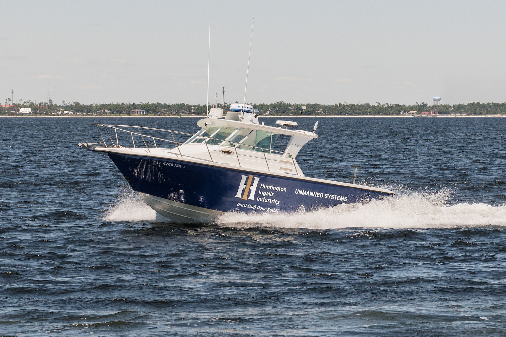 Huntington Ingalls Industries' Proteus unmanned surface vessel (USV) used for testing and development of autonomy capabilities debuts on May 2021. The 27-foot Proteus USV was outfitted with Sea Machines Robotics’ SM300 autonomy system and completed a successful demonstration on Friday, May 14 off the coast of Panama City, Fla. This is the type of vessel that will integrate with Threat Tracker. (courtesy photo)
