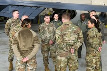 Gen. Gebara talks with Airmen during a meet and greet in a hangar