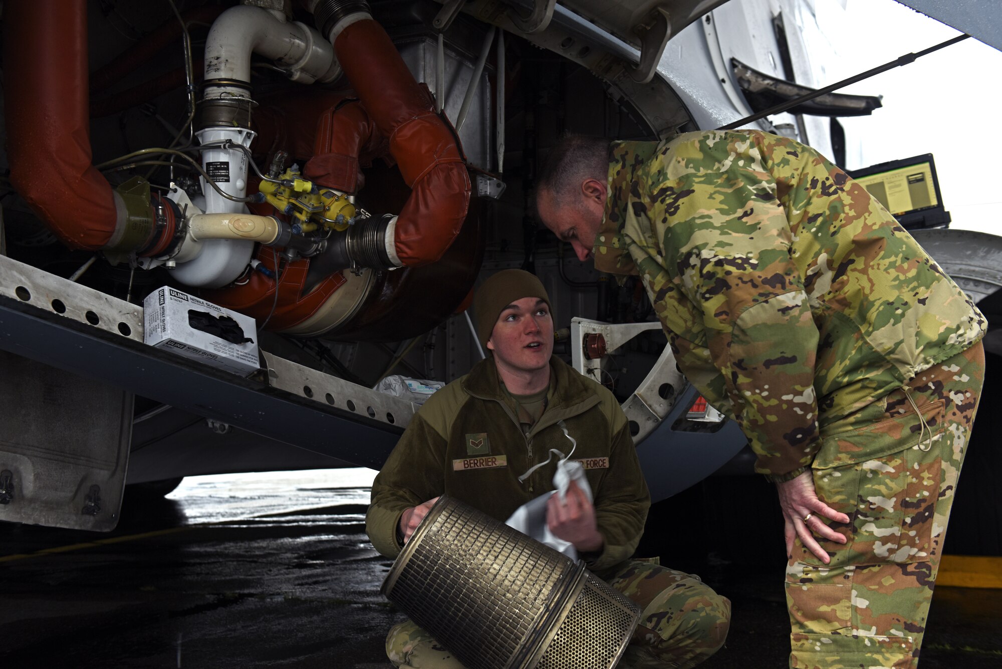(From right) U.S. Air Force Maj. Gen. Thad Bibb, 18th Air Force commander, learns about C-17 Globemaster III maintenance from Senior Airman Stephen Berrier, instruments and flight control systems apprentice with the 62nd Aircraft Maintenance Squadron, during his visit at Joint Base Lewis-McChord, Washington, March 14, 2022. As Air Mobility Command’s sole numbered air force, 18th AF ensures the readiness and sustainment of approximately 36,000 active-duty, Air Force Reserve and civilian Airmen at 12 wings and one stand-alone group. With more than 400 aircraft, 18th Air Force supports AMC’s worldwide mission of providing rapid global mobility to America’s armed forces through airlift, aerial refueling and aeromedical evacuation. (U.S. Air Force photo/Senior Airman Zoe Thacker)