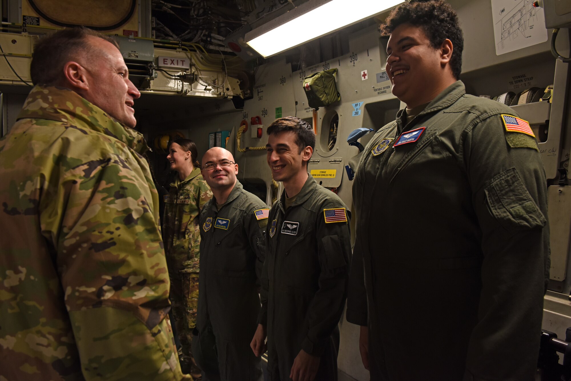 U.S. Air Force Maj. Gen. Thad Bibb, 18th Air Force commander, talks with 62nd Airlift Wing Airmen during his visit at Joint Base Lewis-McChord, Washington, March 14, 2022. Bibb and U.S. Air Force Chief Master Sgt. Chad Bickley, 18th AF command chief, spent two days visiting 62nd AW units and recognized several of the wing’s outstanding performers during their time. (U.S. Air Force photo/Senior Airman Zoe Thacker)