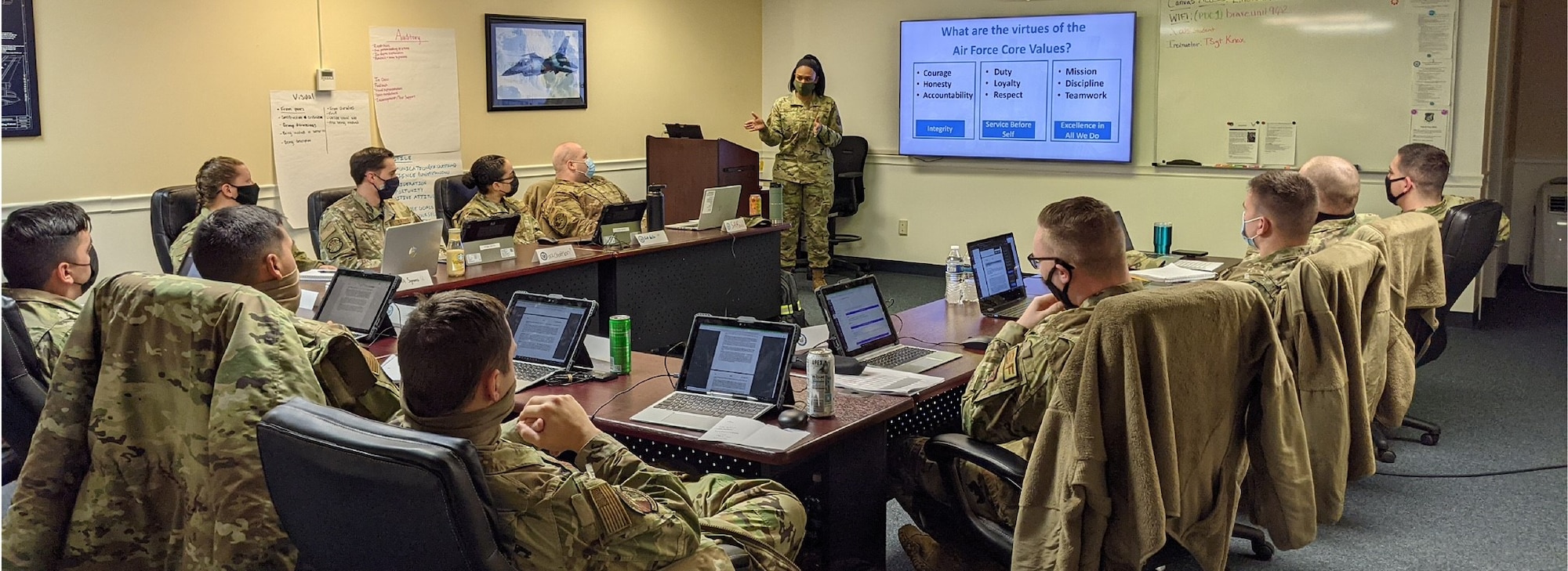 Tech. Sgt. Dorothy Knox speaks to her peers in a briefing at Eielson Air Force Base, Alaska. (Curtesy Photo)