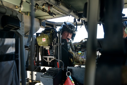 Chief Warrant Officer (5) Herb Stevens, the Illinois National Guard’s Army Aviation Support Facility #2 Commander gives Soldiers a tour of the UH-60V Black Hawk helicopter while on display at the Abraham Lincoln Capital Airport in Springfield, Illinois Jan. 20. The purpose of the tour was to share the many features and benefits of the UH-60V. The Illinois Army National Guard was the first to receive the “V” model, allowing for enhanced situational awareness using a digital environment. (U.S. Army photo by Illinois Army National Guard Sgt. Trenton Fouche)