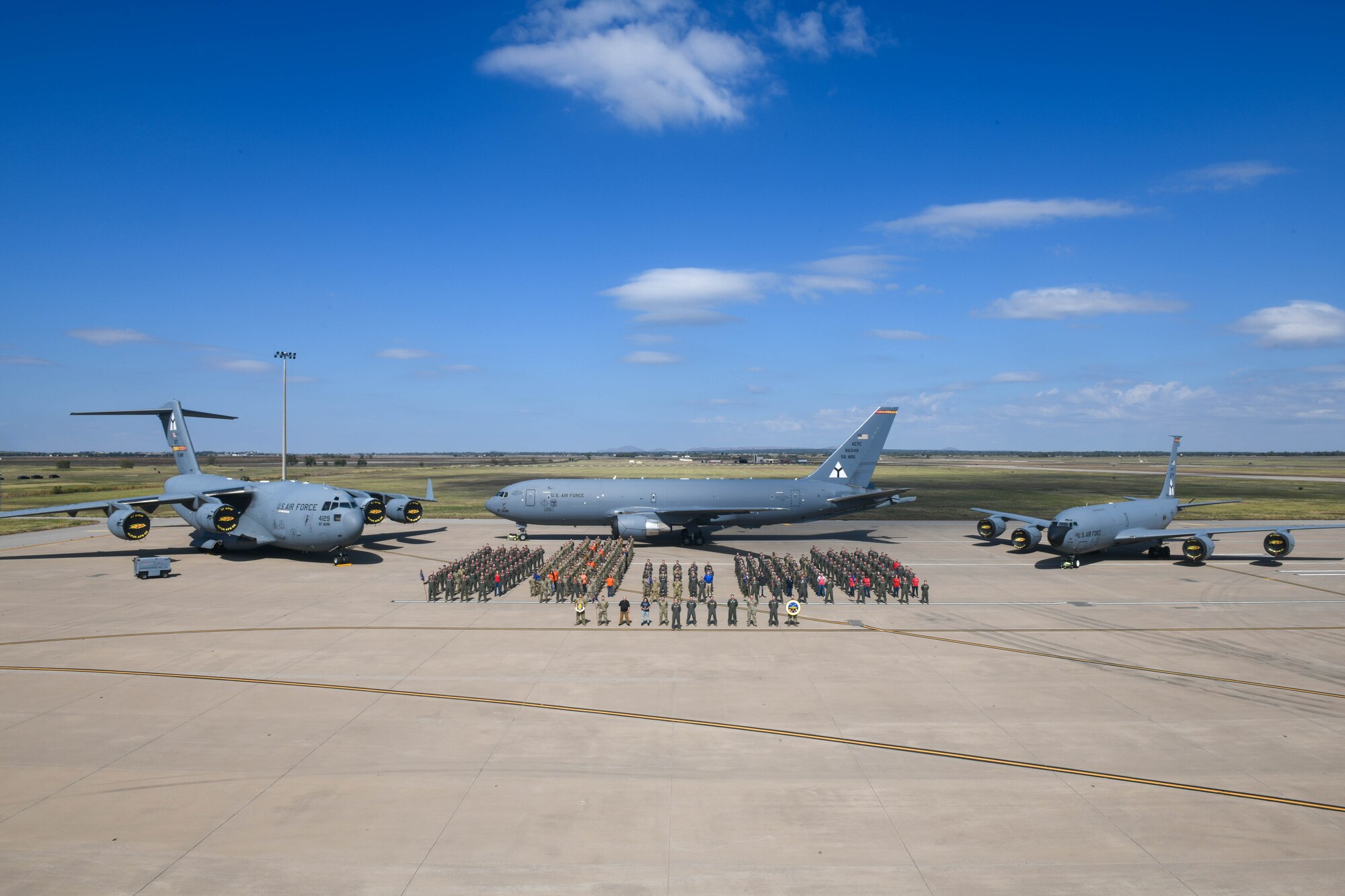 Members from the 97th Operations Group (OG) pose for a squadron photo October 22, 2021, at Altus Air Force Base, Oklahoma. Airmen from the OG won six Air Education and Training Command and Air Force-level awards in 2021. (U.S. Air Force photo by Airman 1st Class Trenton Jancze)