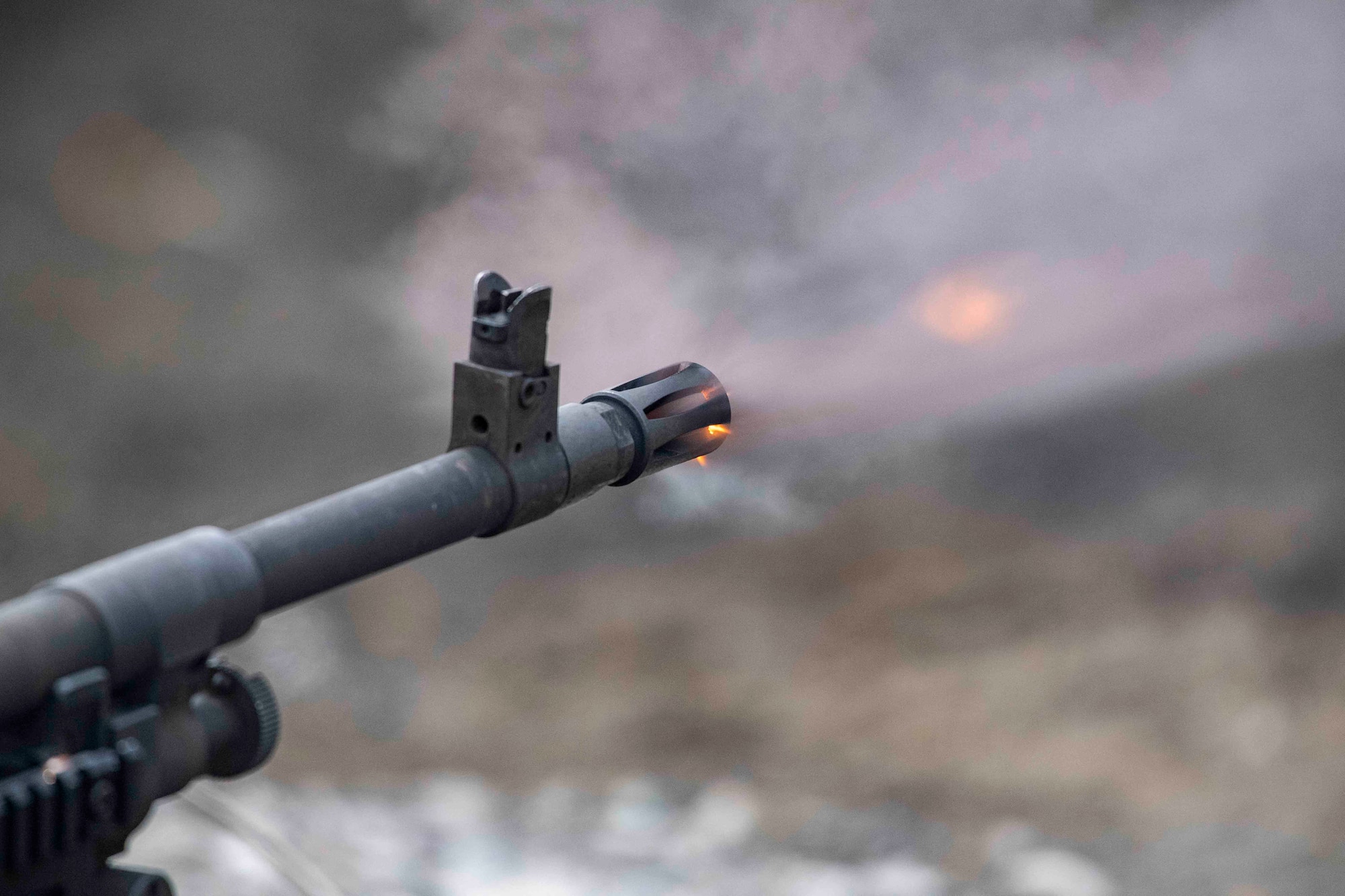 An M240 machine gun fires during an M240 and M249 machine guns qualification at Combined Arms Training Center Camp Fuji, Japan, March 10, 2022.