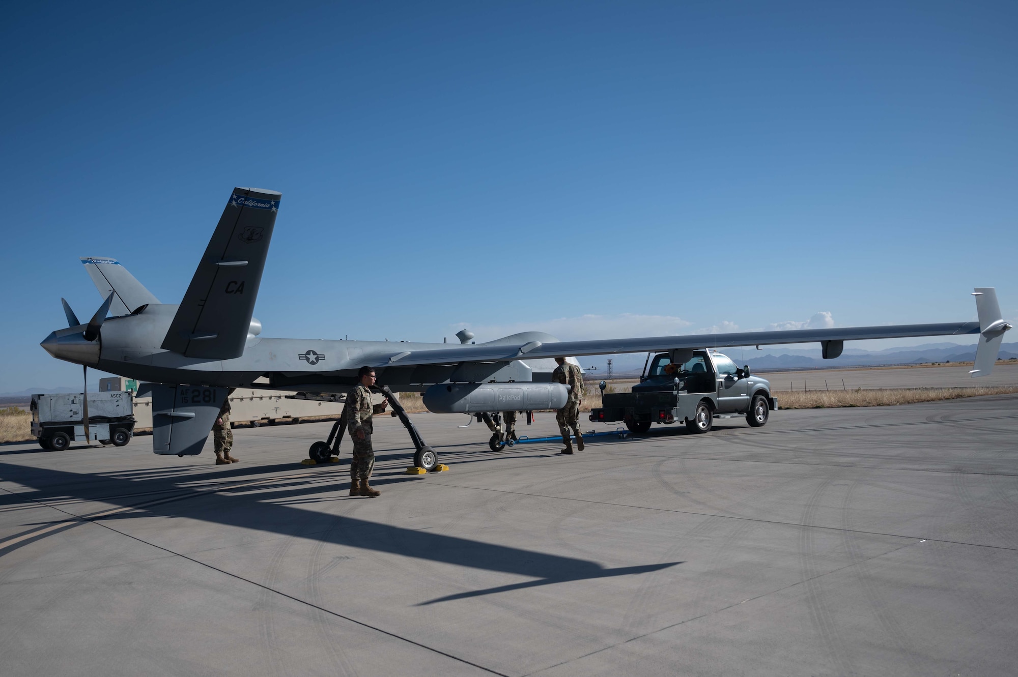 Airmen assigned to the 214 LRE at U.S. Army Fort Huachuca, Arizona, prepare an MQ-9 Reaper for an operational assessment flight with the REAP 2.0 payload on March 11.