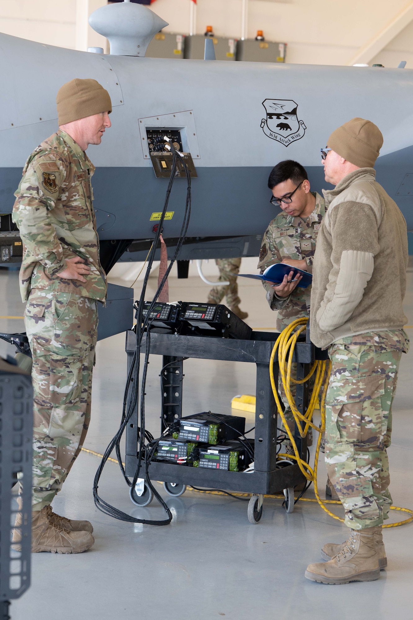 Airmen assigned to the 214 LRE at U.S. Army Fort Huachuca, Arizona, prepare an MQ-9 Reaper for an operational assessment flight with the REAP 2.0 payload on March 11.
