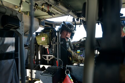 Chief Warrant Officer 5 Herb Stevens, the Illinois National Guard’s Army Aviation Support Facility #2 commander, gives Soldiers a tour of the UH-60V Black Hawk helicopter while on display at the Abraham Lincoln Capital Airport in Springfield, Illinois, Jan. 20, 2022. The Illinois Army National Guard was the first to receive the “V” model, allowing for enhanced situational awareness using a digital environment.